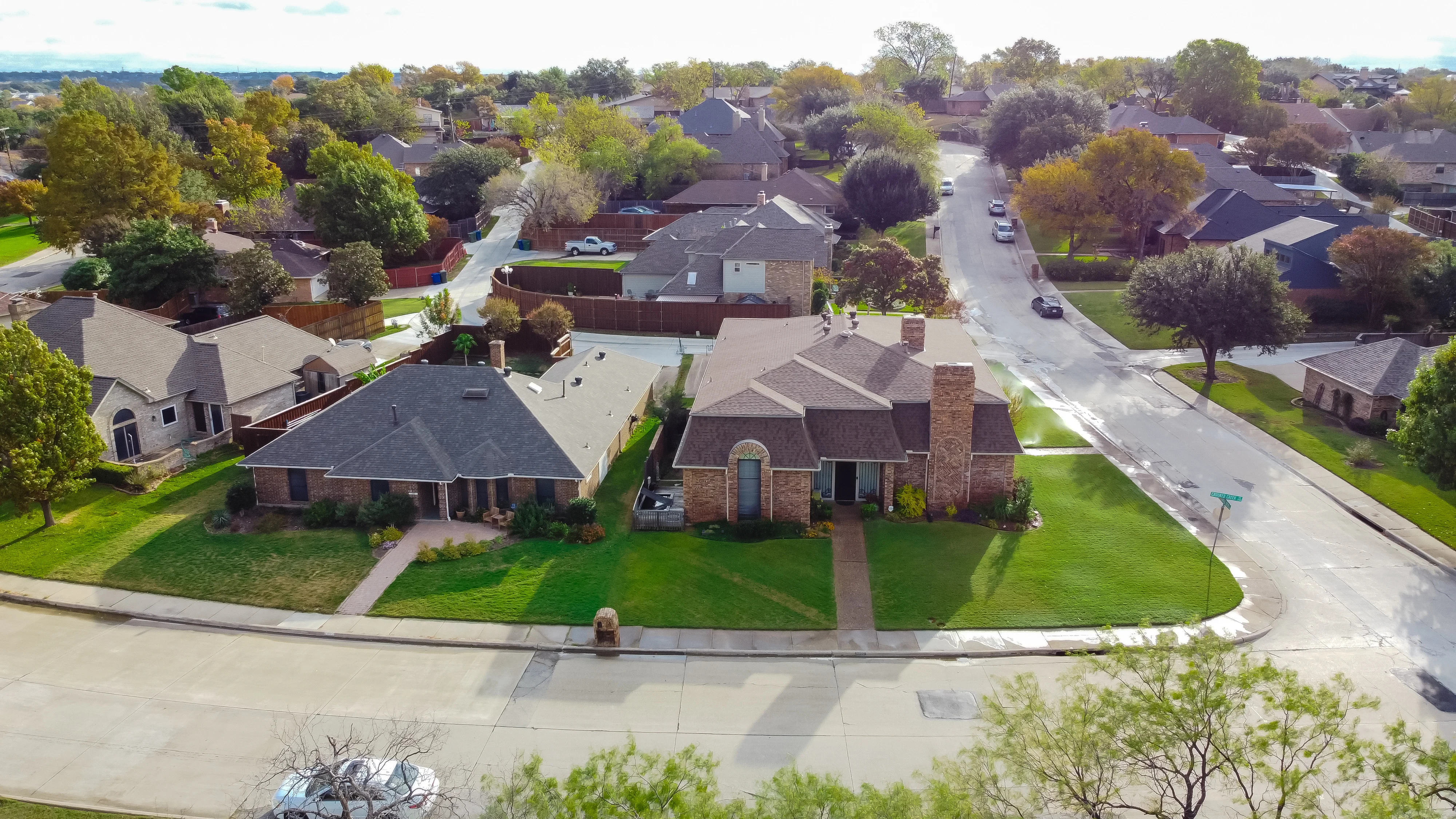 Aerial View Parkside Single Family Houses Subdivision with Large Backyard in Carrollton, Texas, USA
